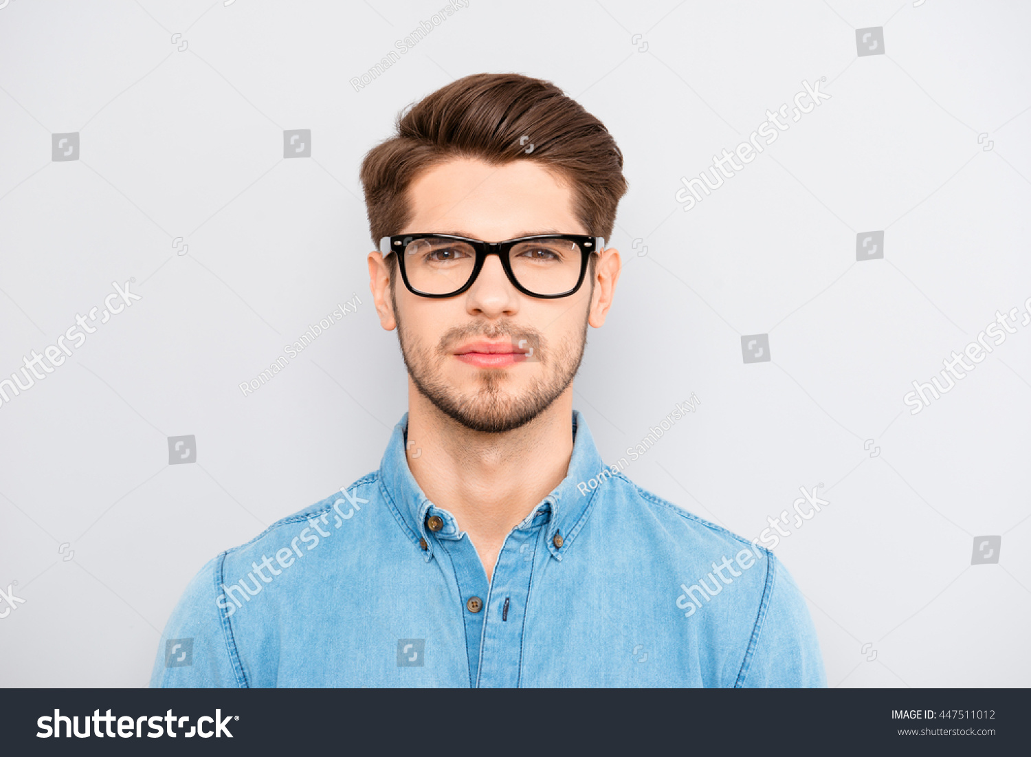 Portrait of serious calm minded businessman wearing glasses #447511012