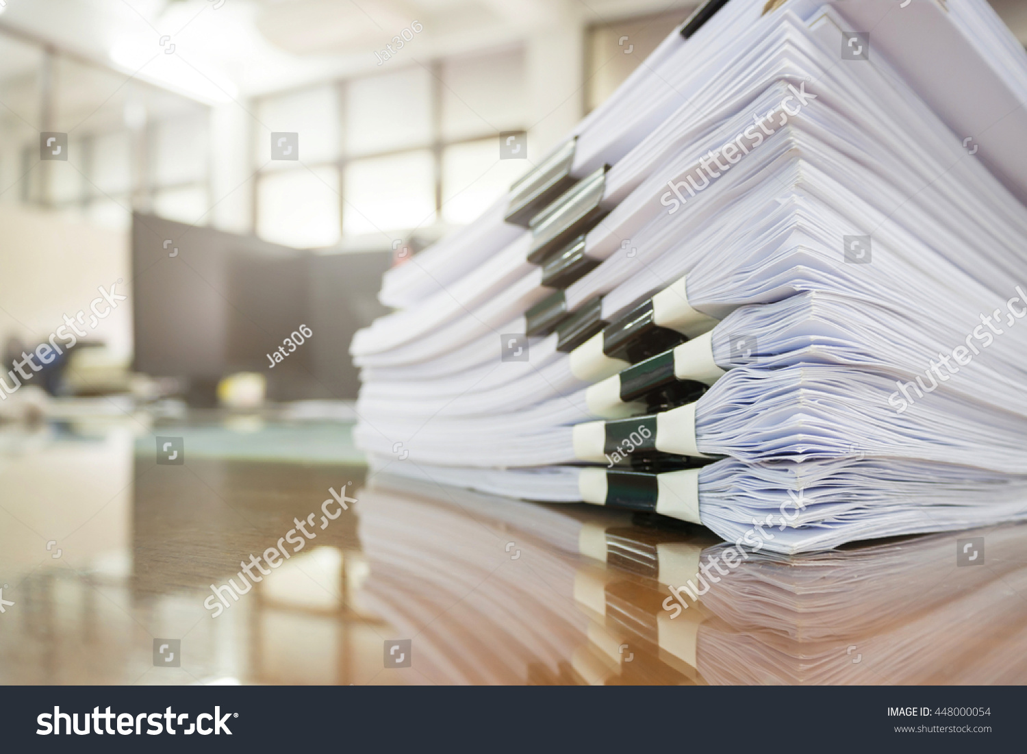 Pile of unfinished documents on office desk, Stack of business paper #448000054