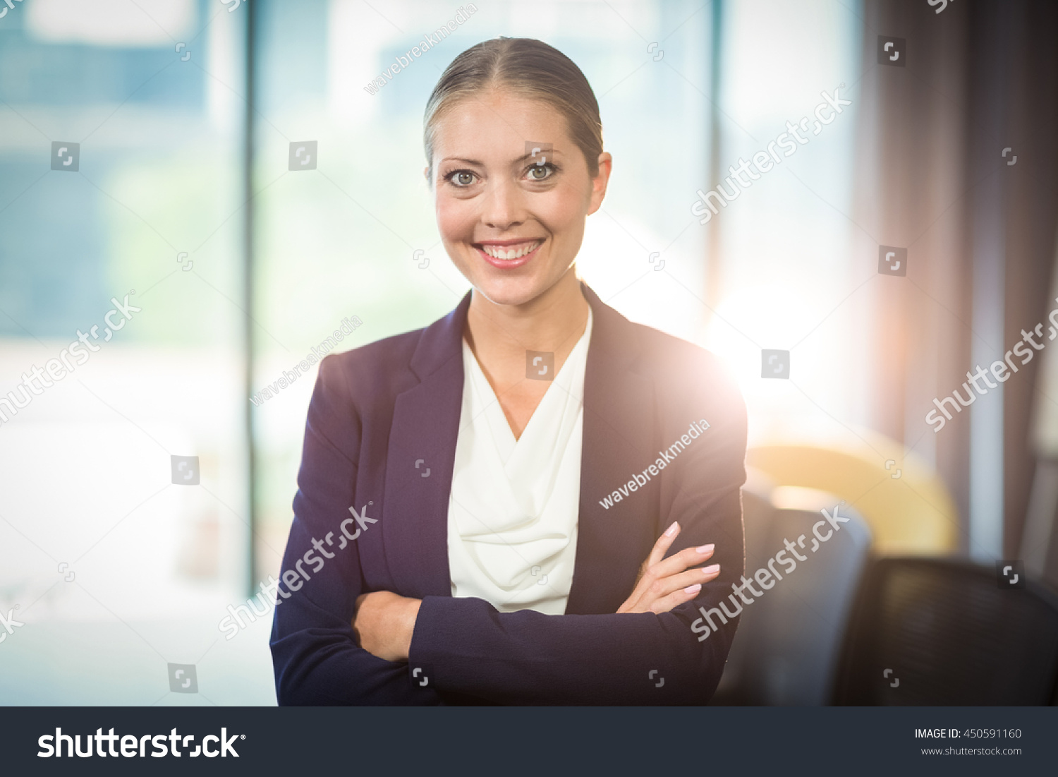 Portrait of businesswoman standing in the office #450591160