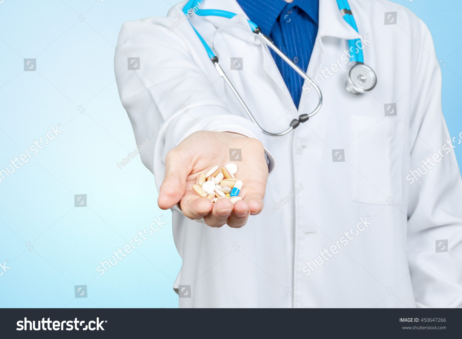 Doctor giving you a pill #450647266