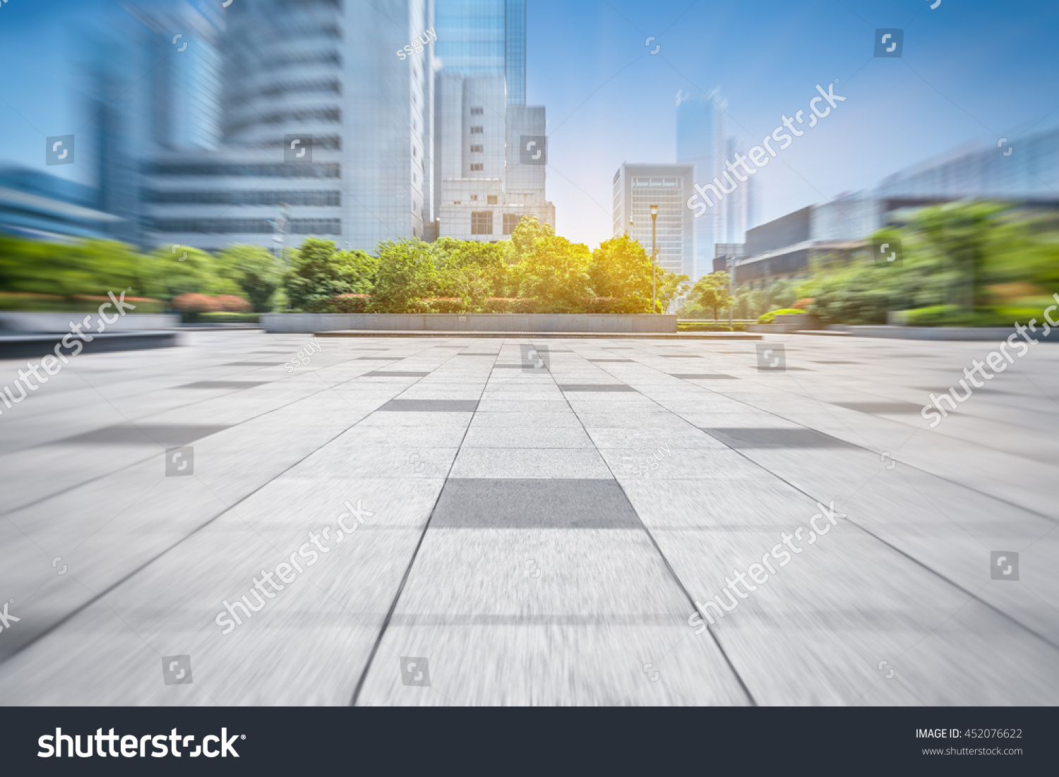 empty pavement and modern buildings in city #452076622