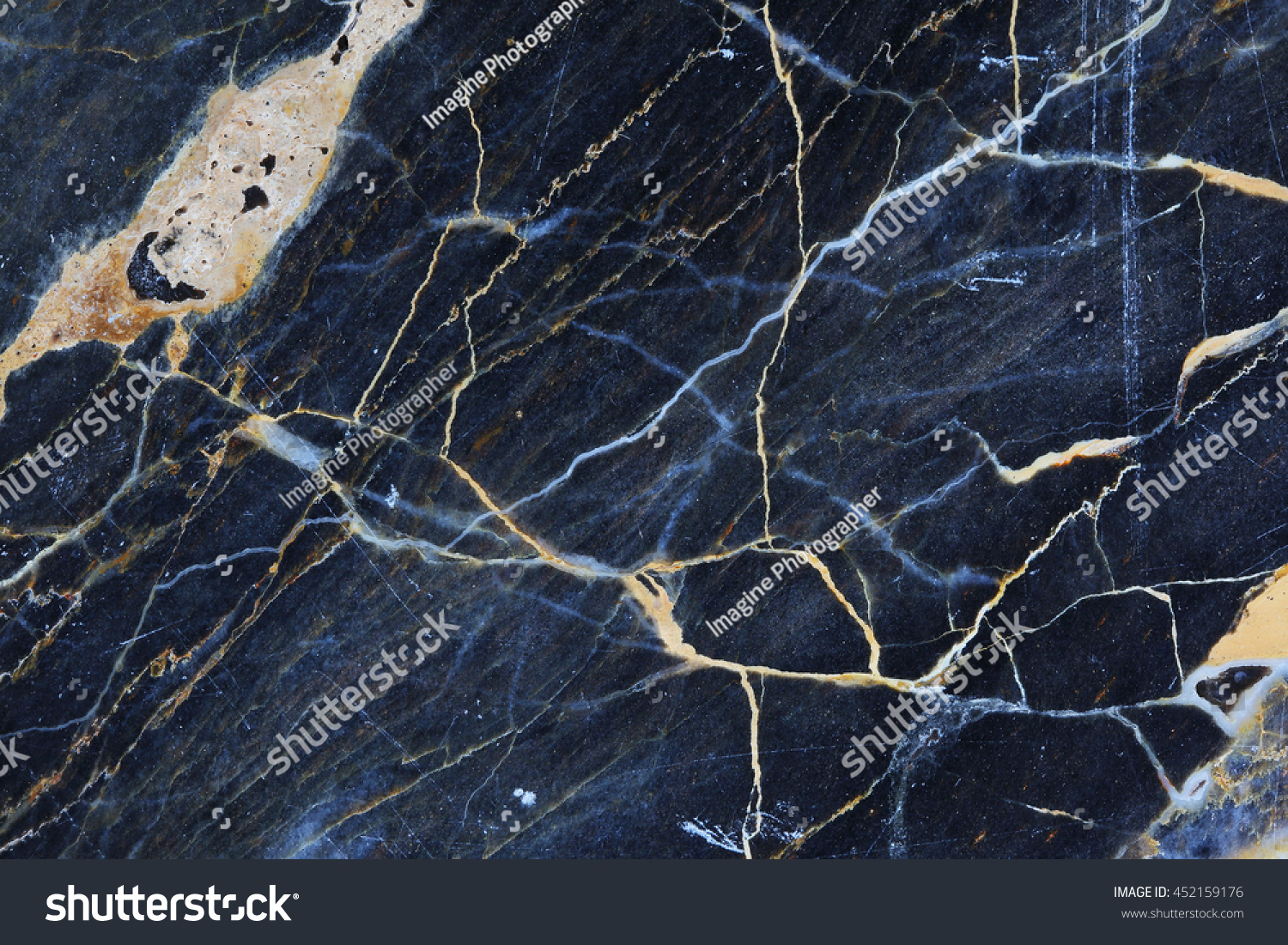 Gold, yellow and white patterned natural structure of dark gray blue marble texture background. #452159176