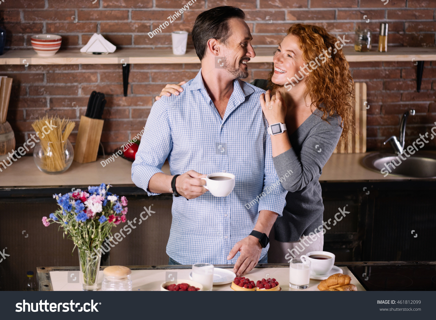 Woman embracing man in the kitchen #461812099