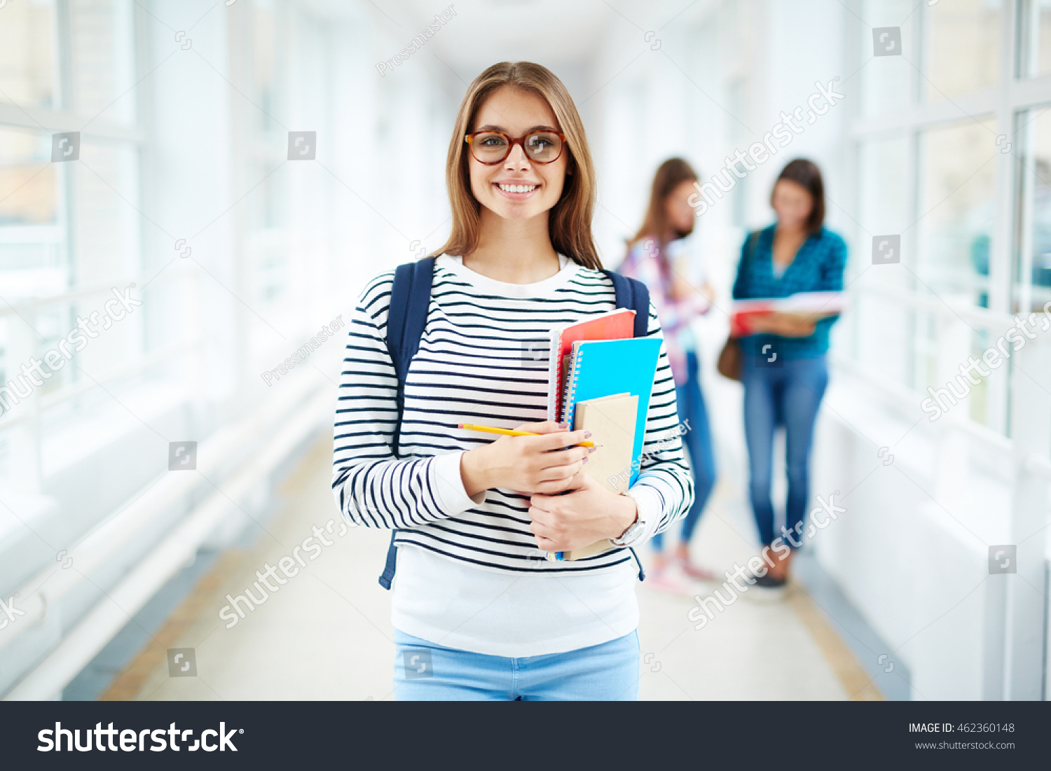 Portrait of female college student smiling at camera #462360148