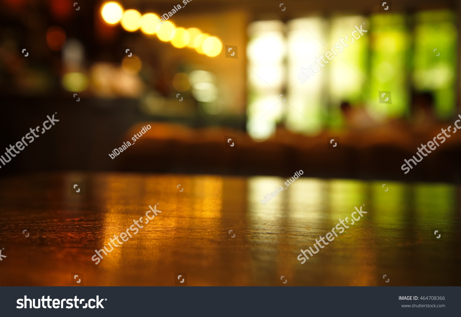 blur light reflection on table in bar at night background #464708366