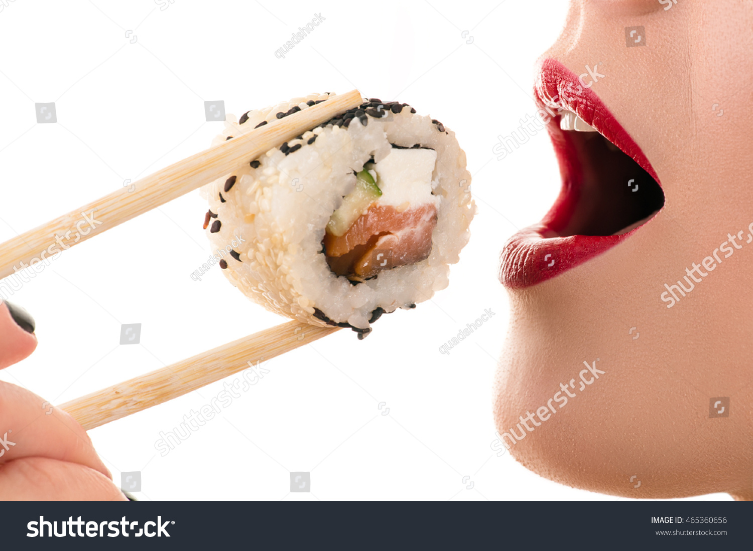 woman eating roll closeup #465360656