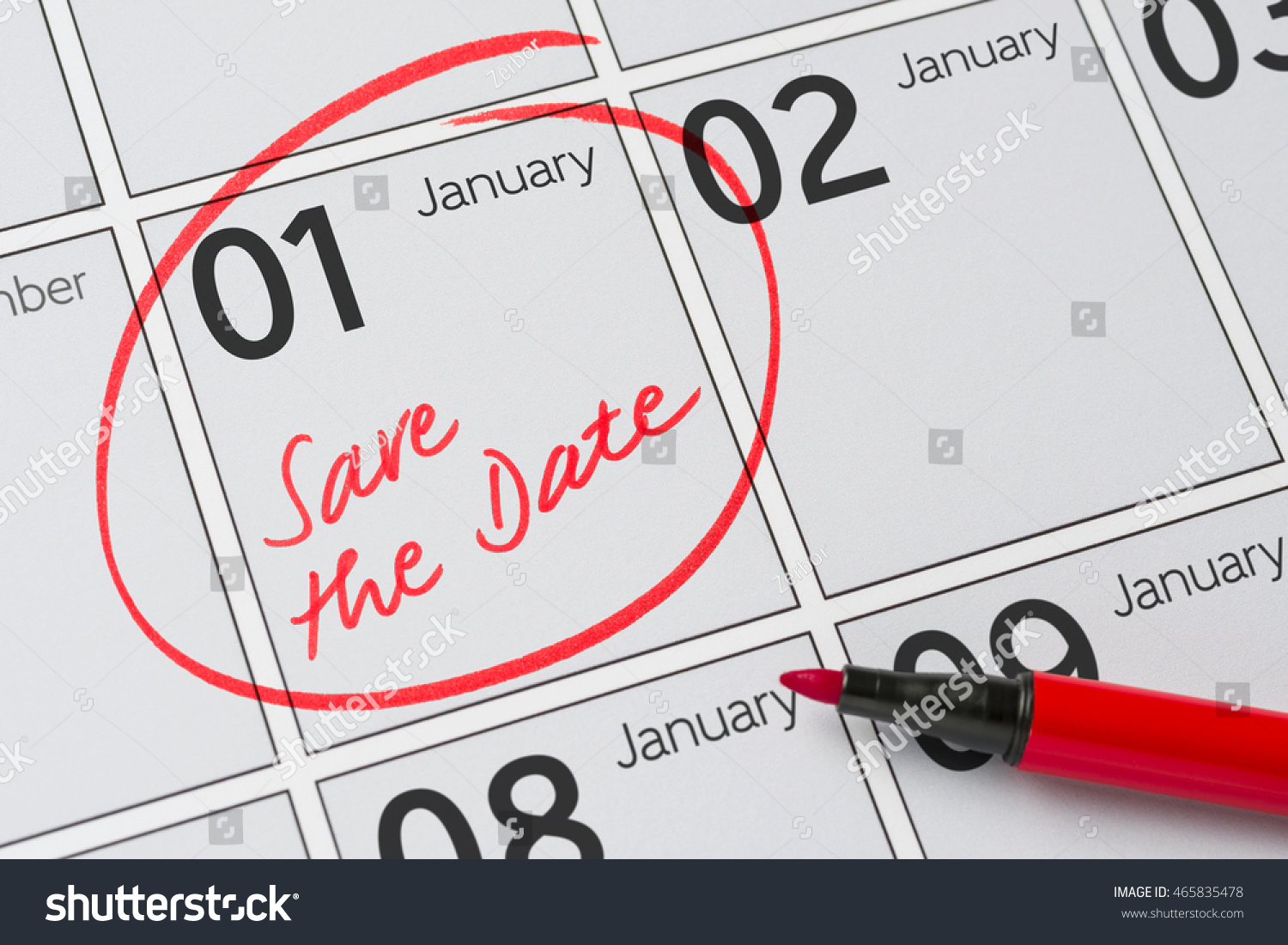 Save the Date written on a calendar - January 1 #465835478