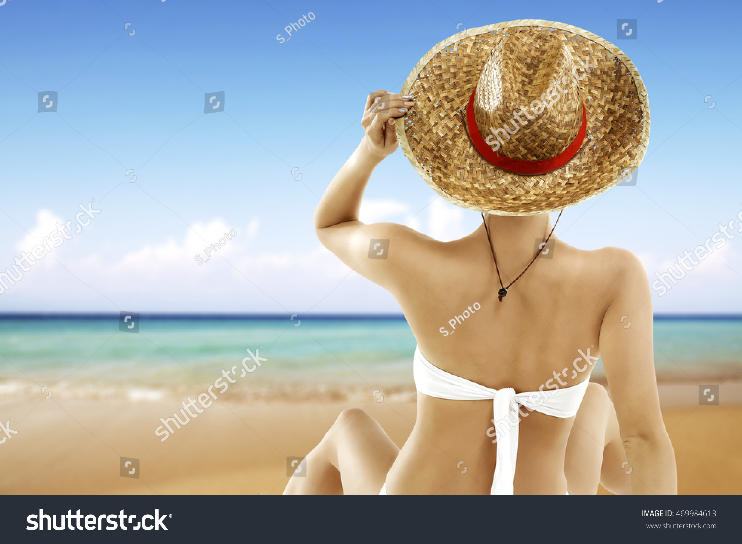 woman in white bikini and blue sea  #469984613