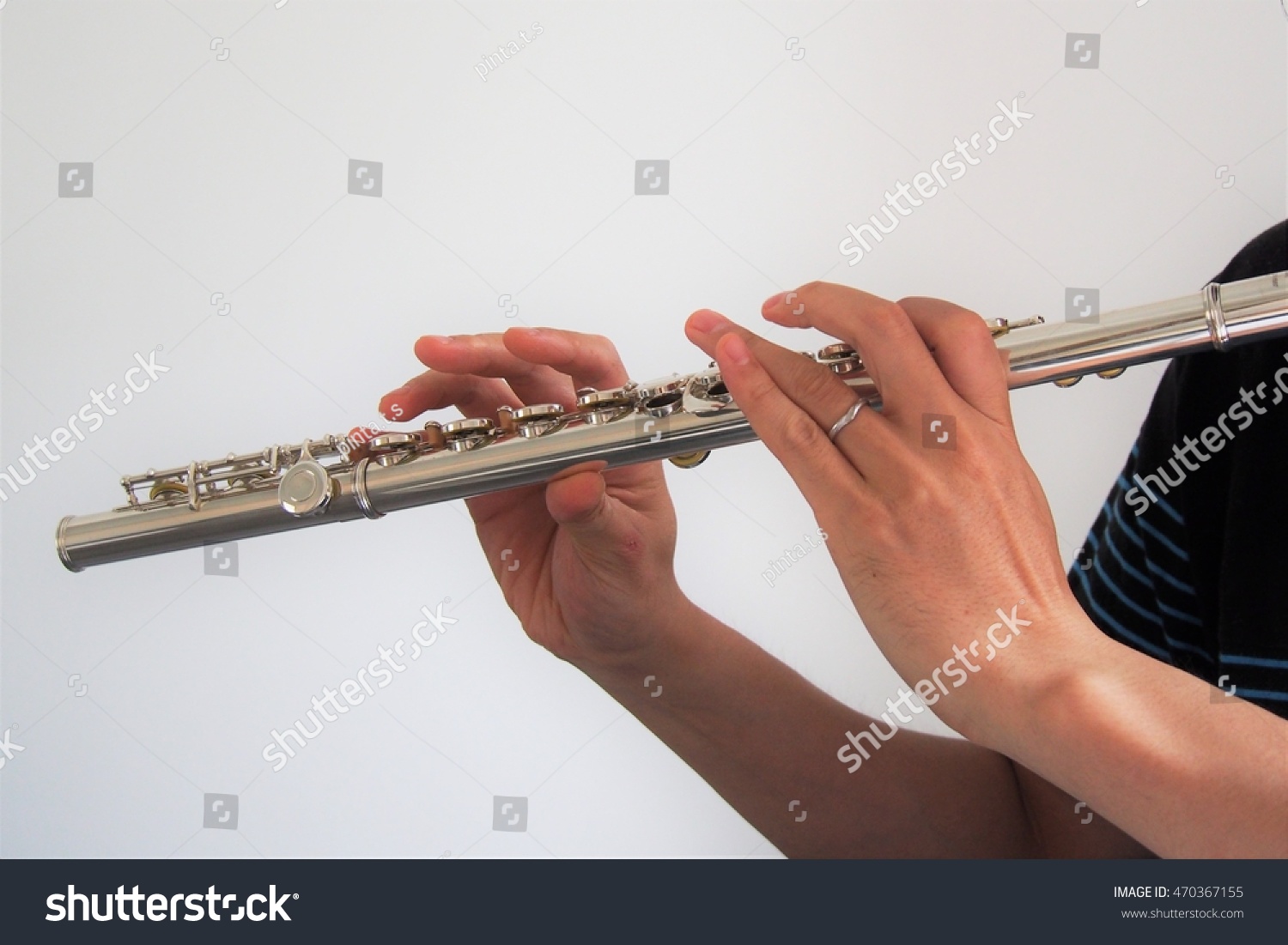 playing the flute #470367155