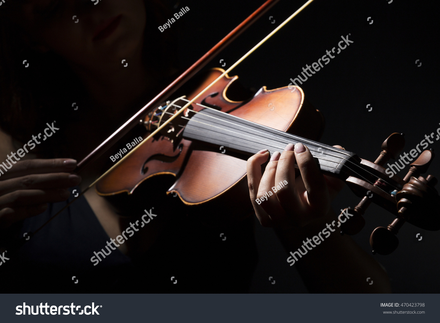 Violinist holding in your hands the violin.  #470423798