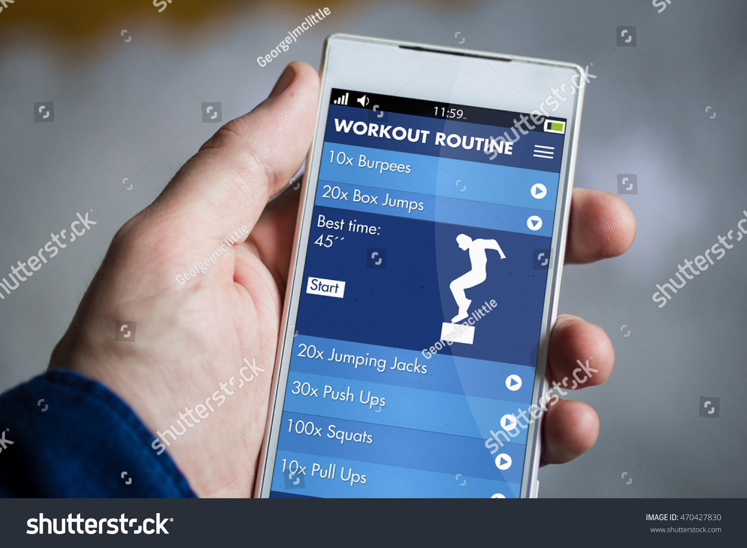 man hand holding fitness app smartphone. All screen graphics are made up. #470427830
