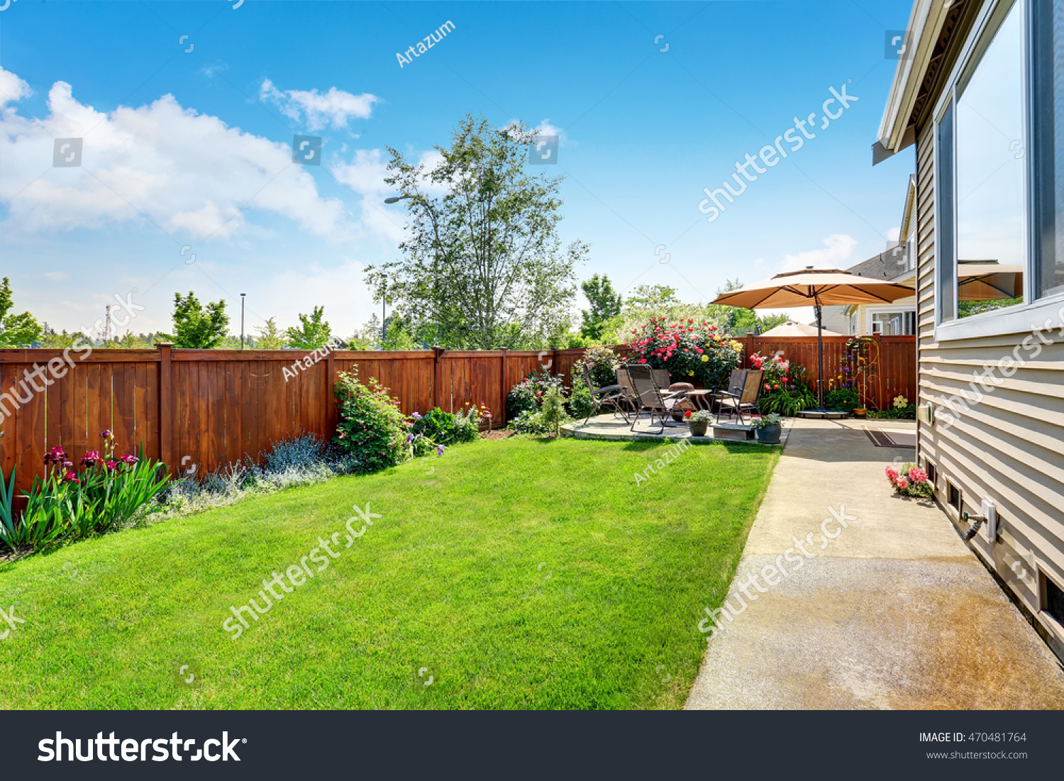 Beautiful landscape design for backyard garden and patio area on concrete floor. Northwest, USA #470481764