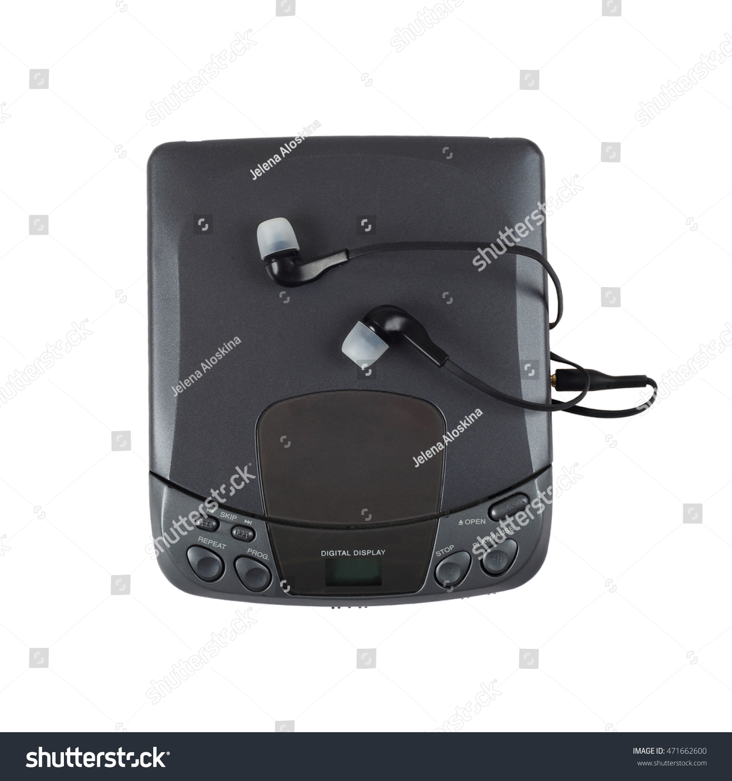 Old portable CD audio player with headphones isolated on white background in square #471662600