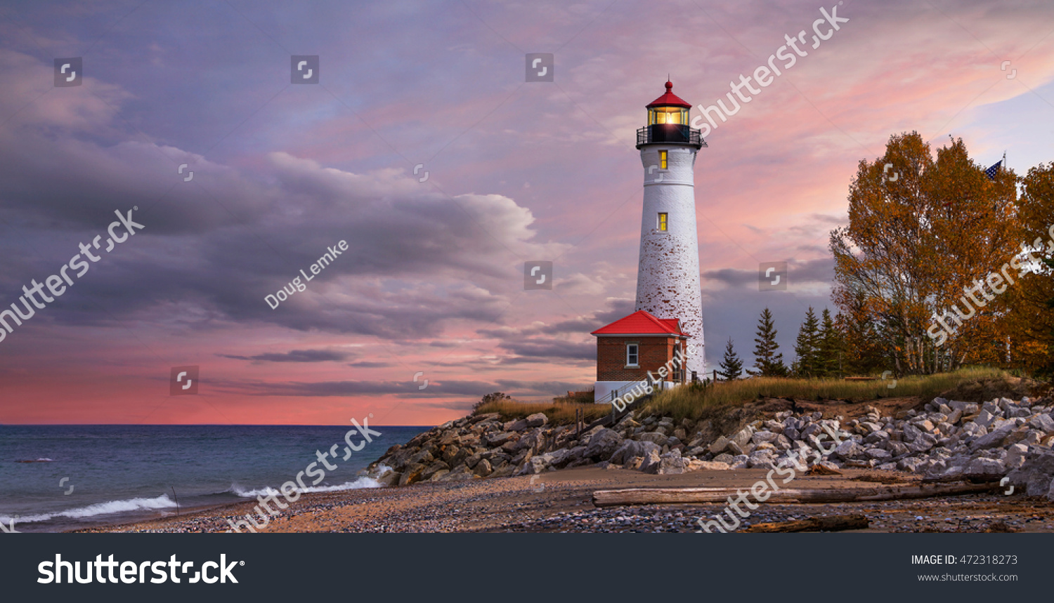 As daylight begins yielding to twilight, The Crisp Point Lighthouse at sunset on Lake Superior, Upper Peninsula, Michigan, USA - A one hour drive from Tahquamenon Falls, mostly dirt roads #472318273