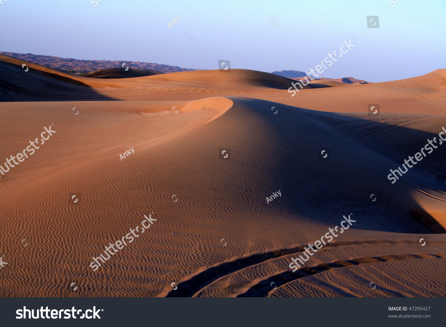 Desert safari dune bashing near Dubai, at sunset. #47295427