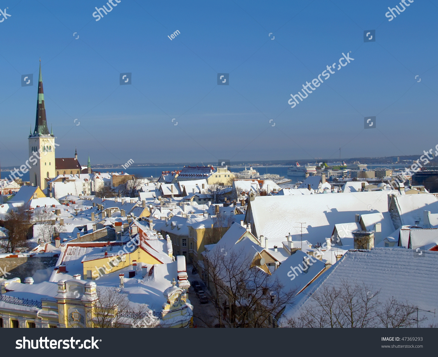 Fresh snow on roofs of old Tallinn #47369293