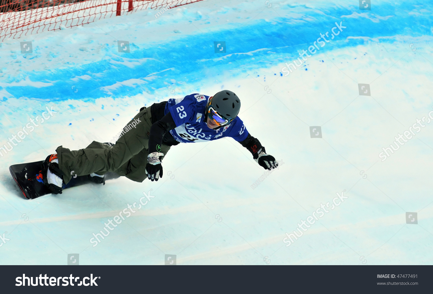 VEYSONNAZ, SWITZERLAND - JANUARY 15: Ladies finalist Faye Gulini of the USA competes in the FIS World Championship Snowboard Cross  Finals January 15, 2010 in Veysonnaz, Switzerland. #47477491