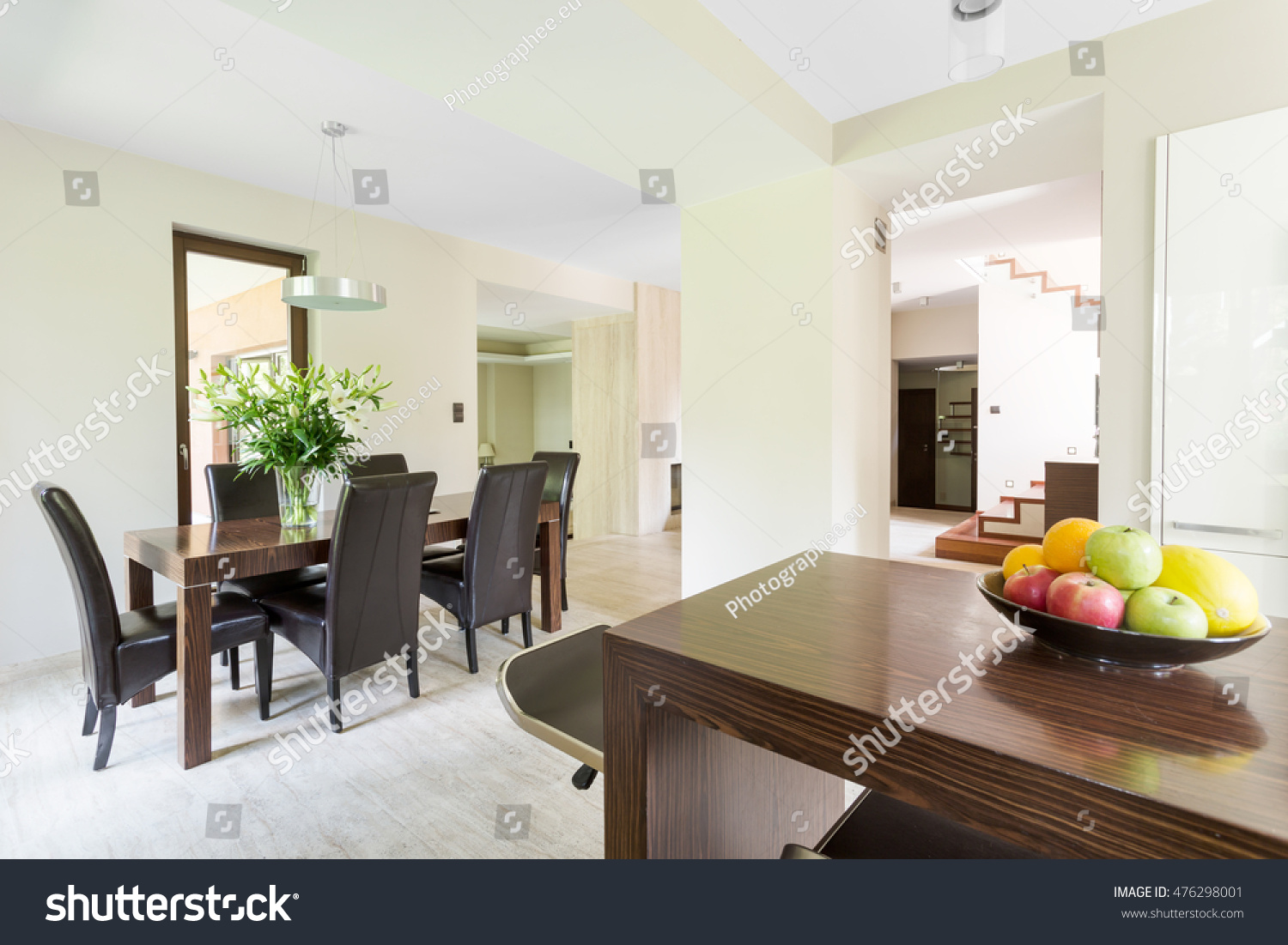 Imposing dining room in a large house with travertine floor #476298001