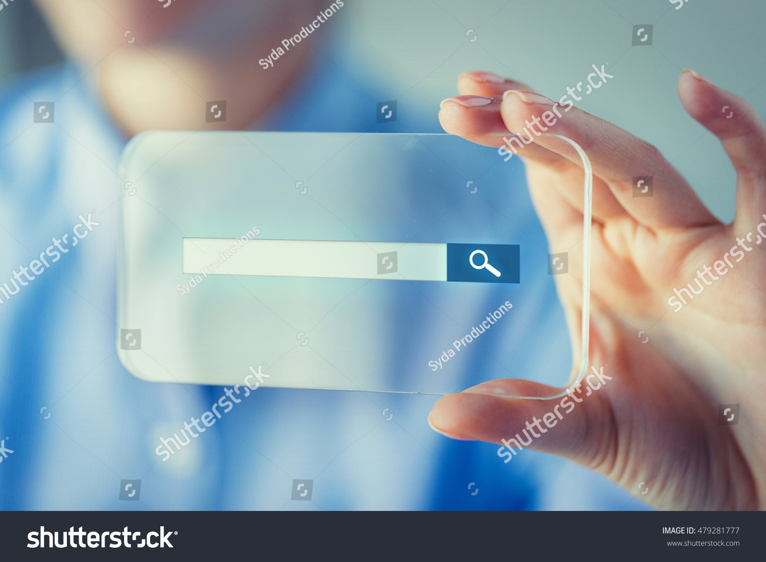 business, technology, network, web and people concept - close up of woman hand holding and showing transparent smartphone with browser search bar on screen #479281777