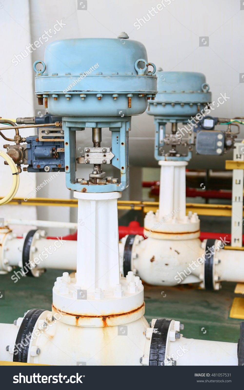 Pressure control valve in oil and gas process and controlled by Program Logic Control, PLC controller the valve and control instrument gas supply to actuator of the valve as PLC command. #481057531