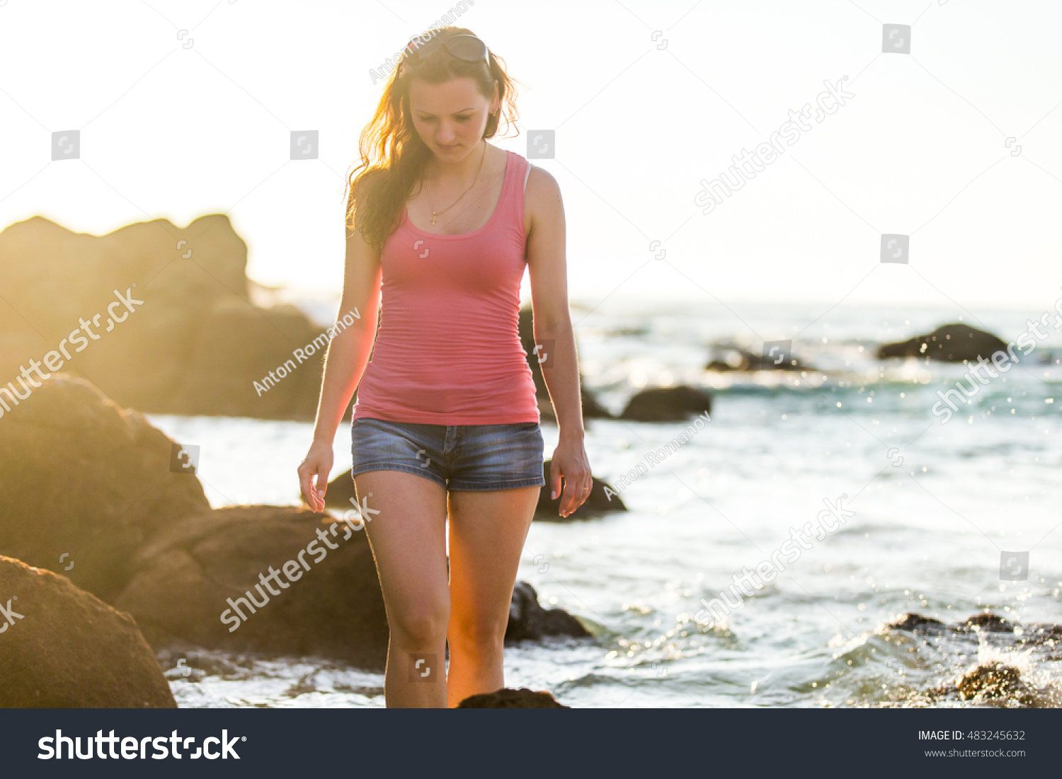 Beautiful Russian girl in shorts and a pink - Royalty Free Stock Photo ...