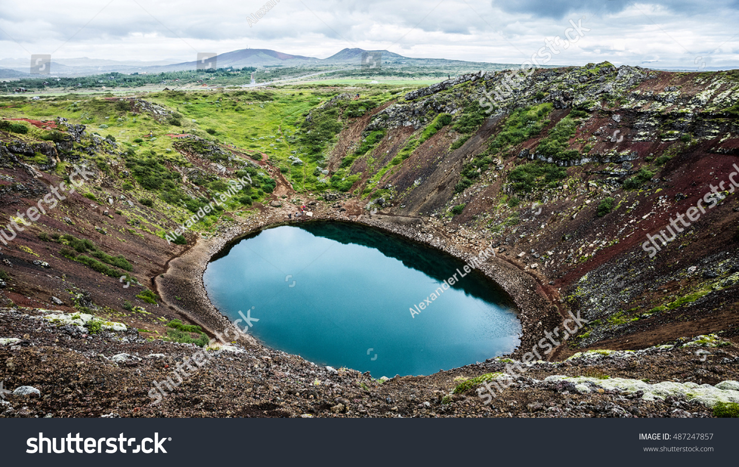 Kerid volcanic crater lake on the touristic golden circle route in Iceland in summer #487247857