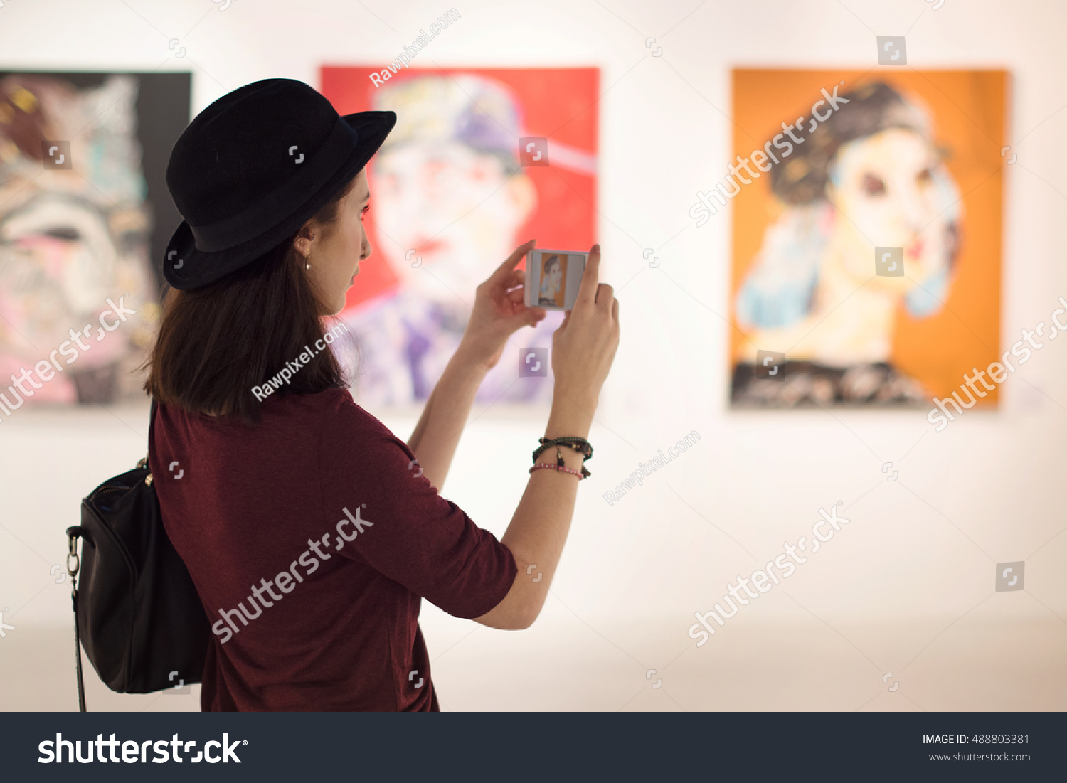 Woman Visiting Art Gallery Lifestyle Concept #488803381