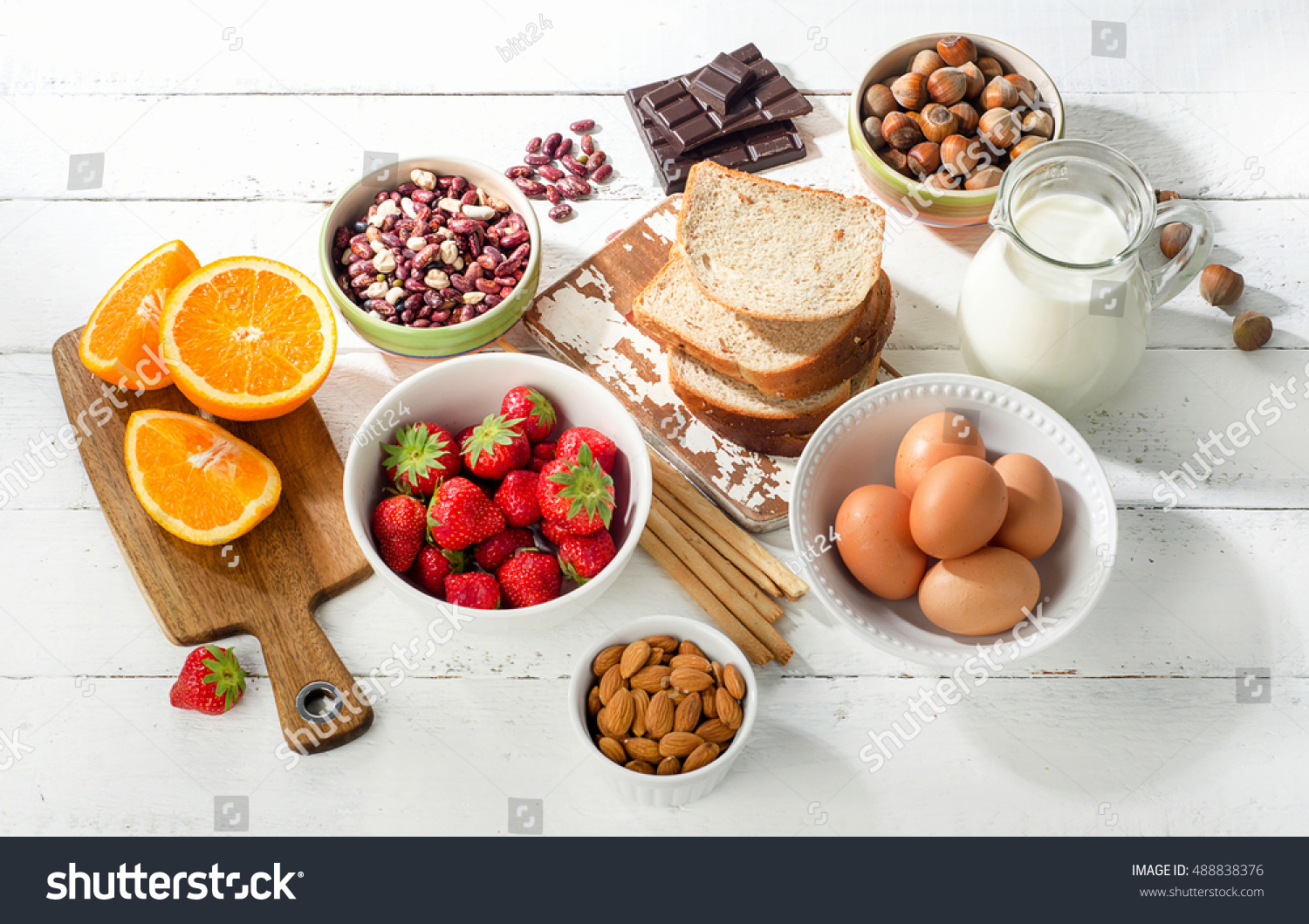 Allergy food concept. Allergic food on a white wooden background. Top view #488838376