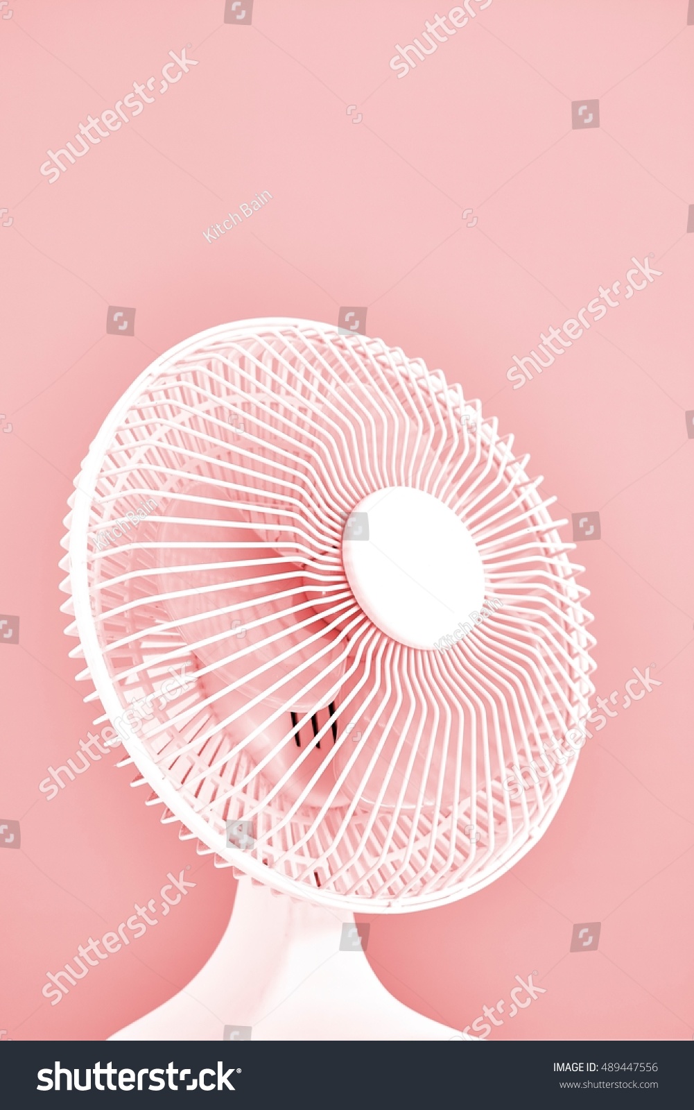 A studio photo of a portable electric fan #489447556
