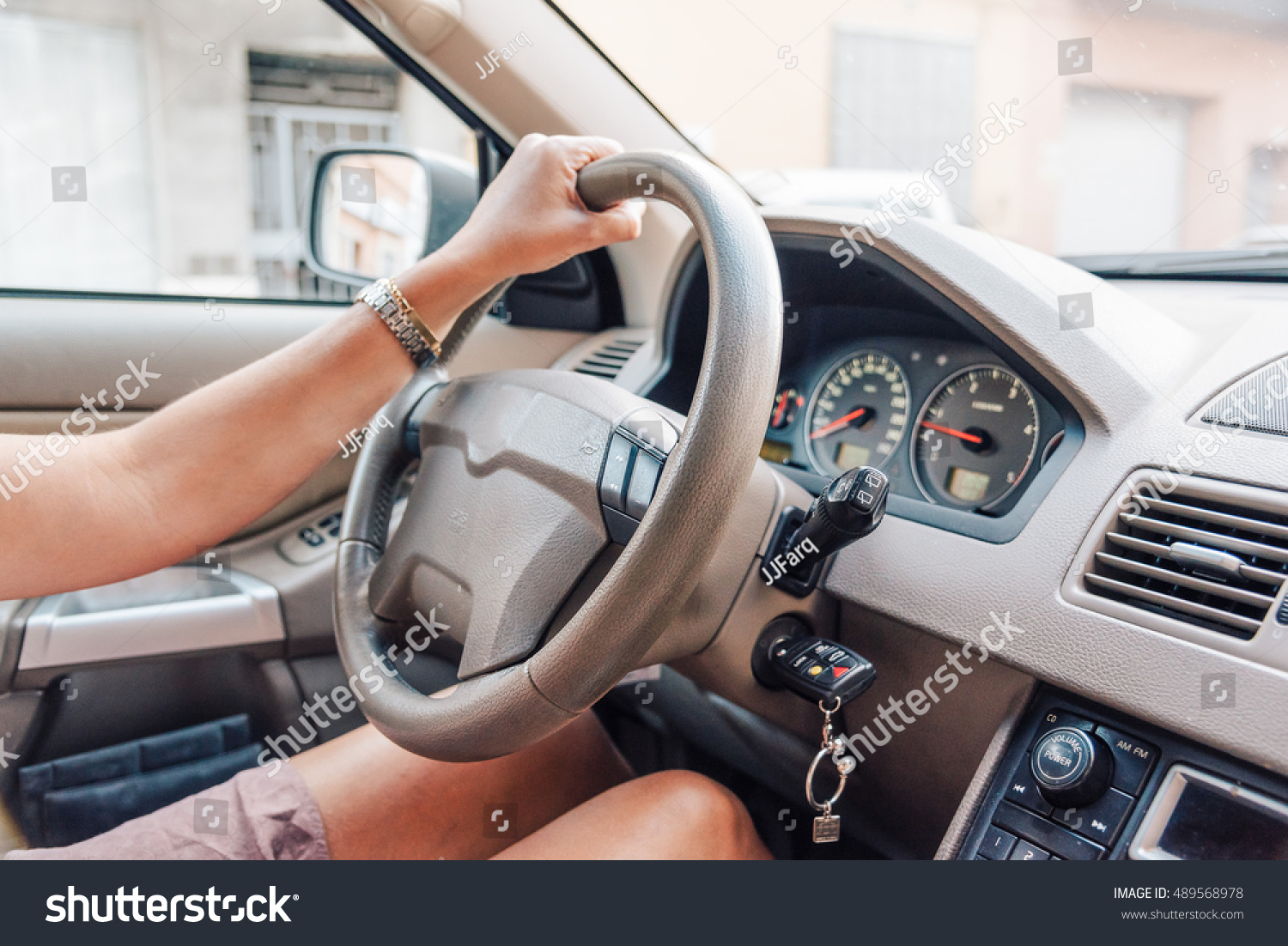 Close up of woman hands driving a car. #489568978