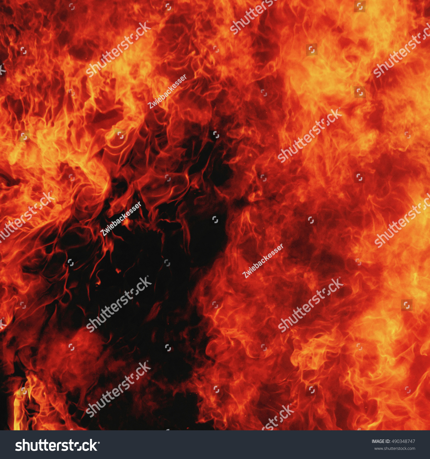background of fire as a symbol of hell and eternal torment #490348747