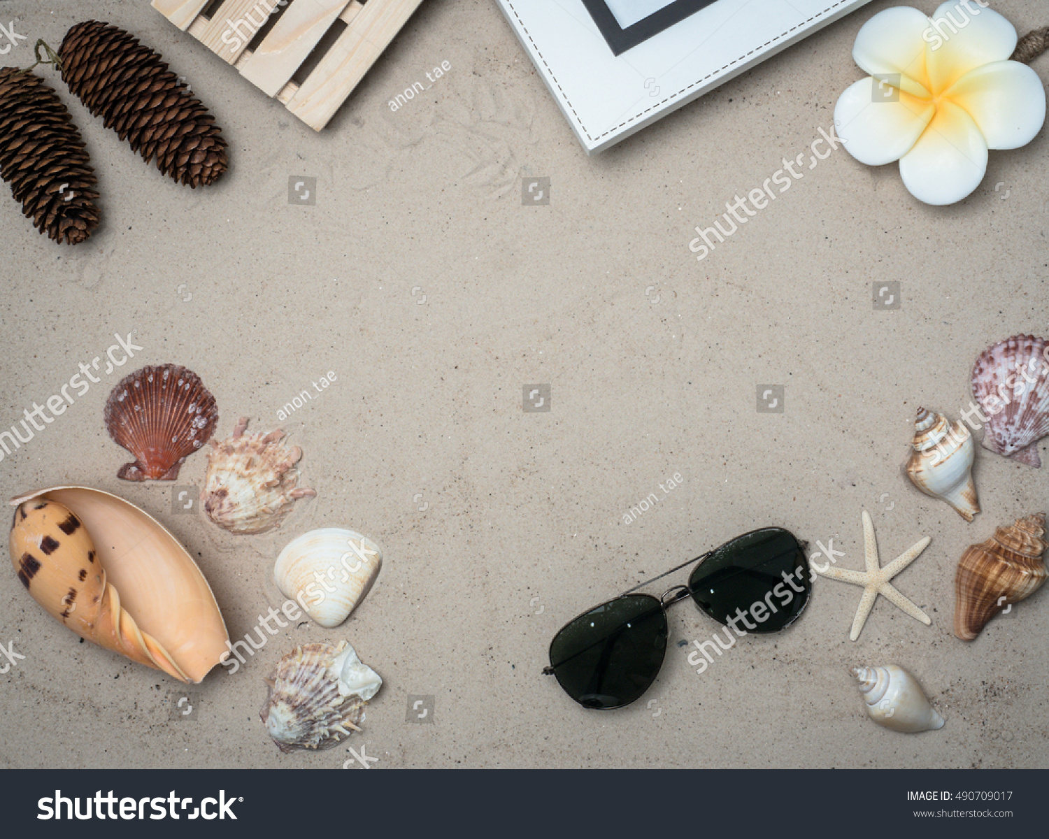 TOP VIEW SAND BACKGROUND WITH  SHELL ,STARFISH,SUMMER TIME TRAVEL CONCEPT #490709017
