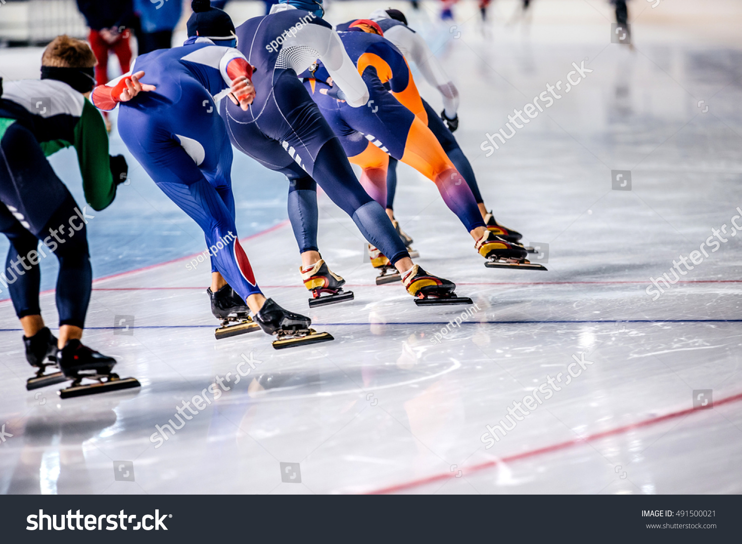 group of men skating on ice sports arena. warm-up before competitions in speed skating #491500021