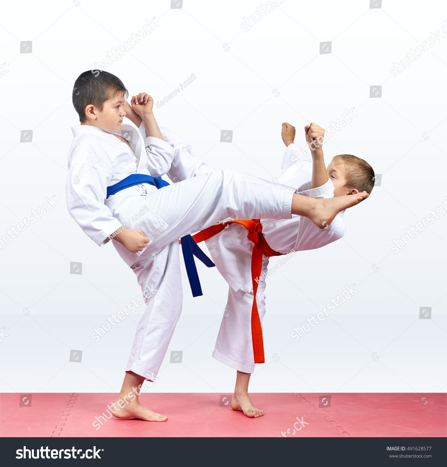 Karate children are beating kicks #491628577