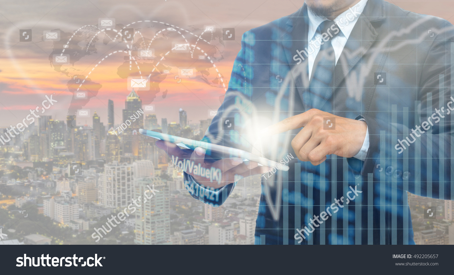 Double exposure of businessman using the tablet with Stock market chart on blurred building with connection and email background, Business Trading and connection concept #492205657