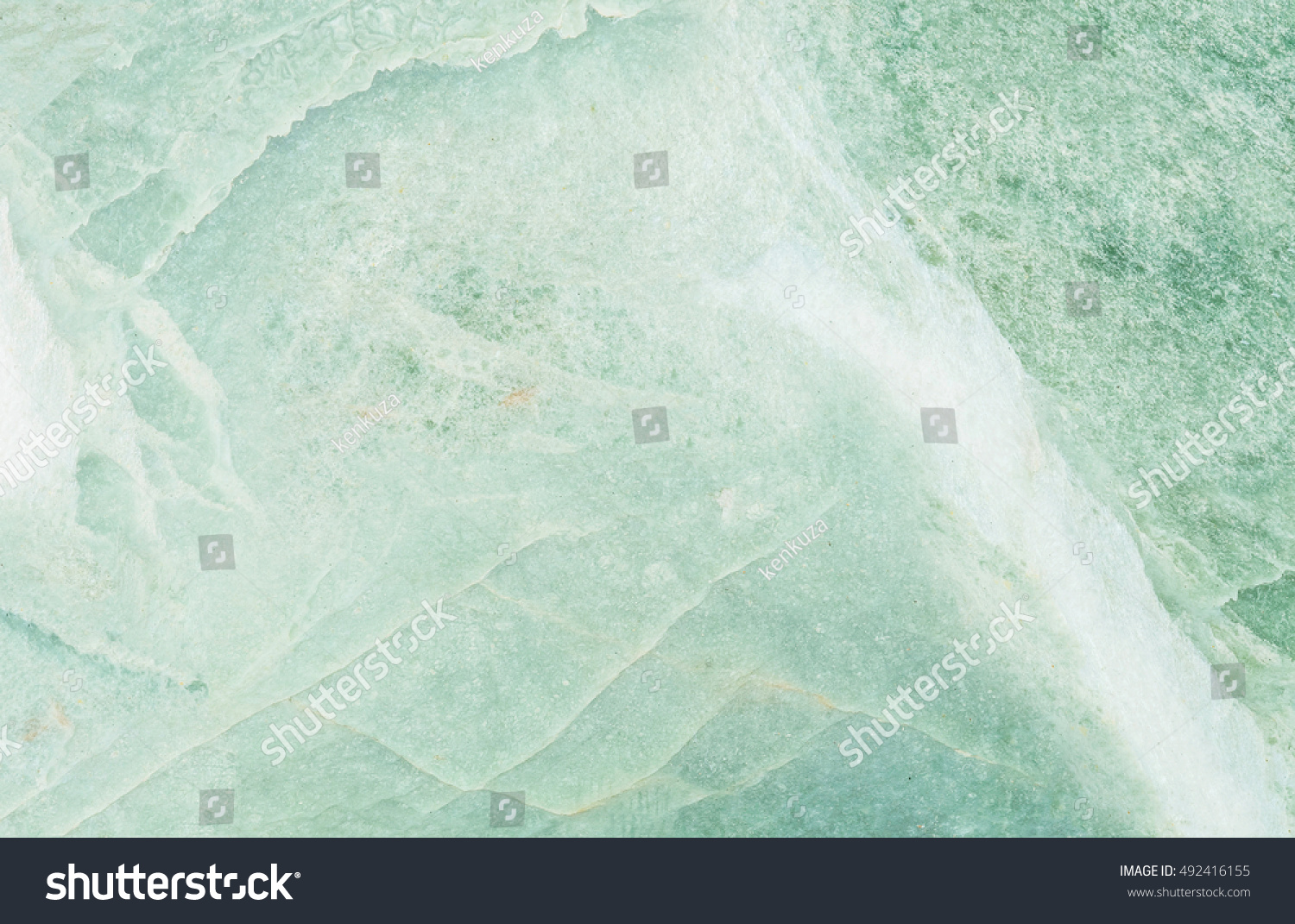 Closeup surface marble pattern at green marble stone wall textured background #492416155