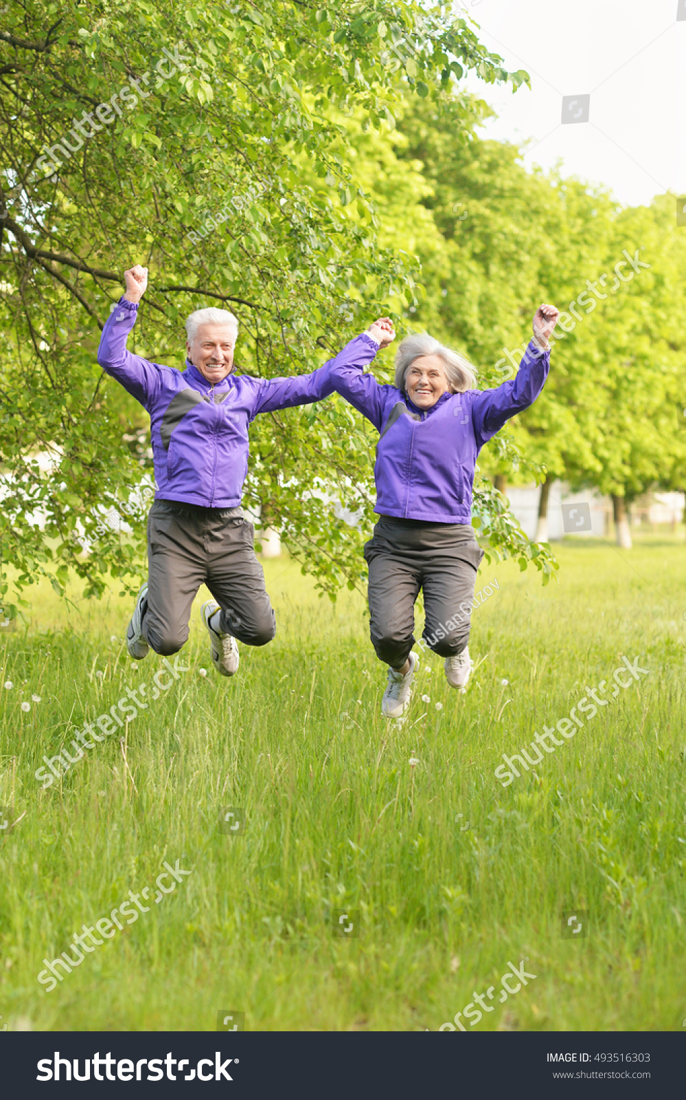 fit senior couple exercising #493516303