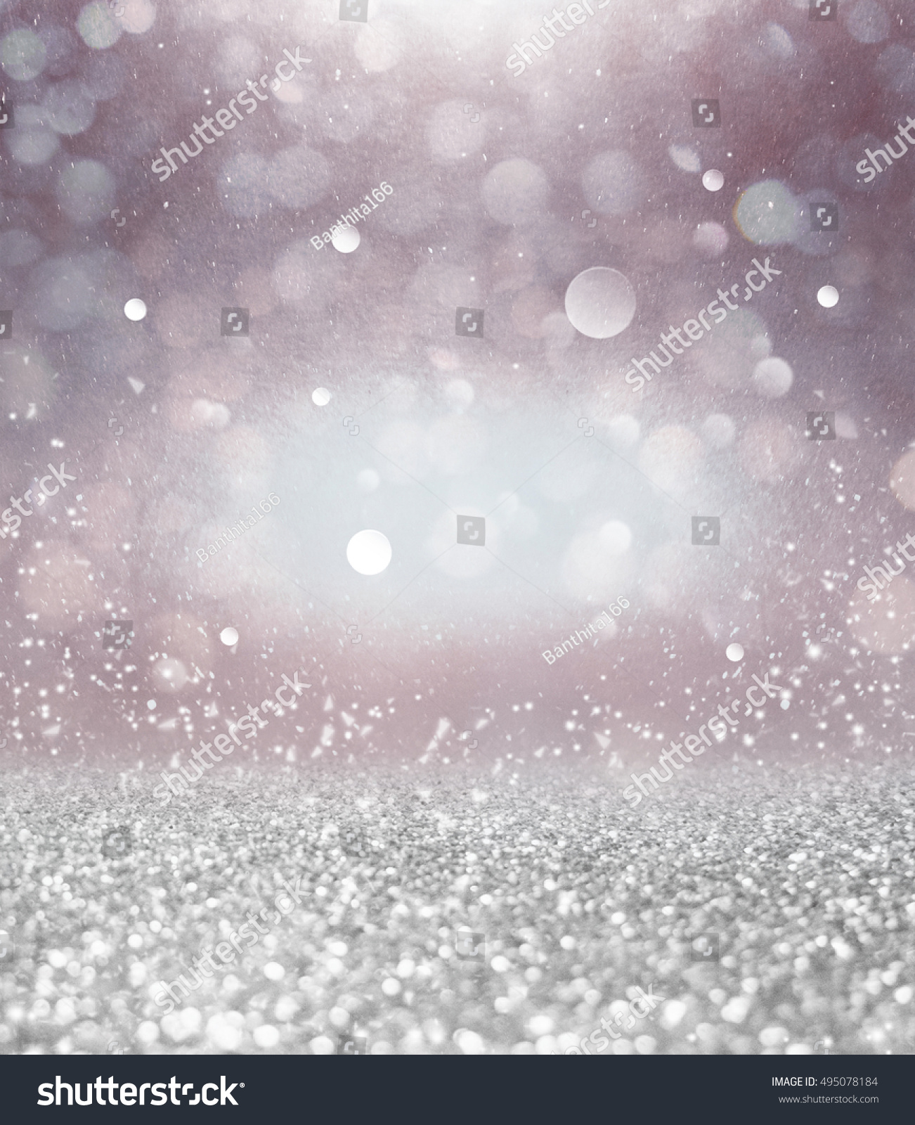 Abstract of Bright and sparkling bokeh background. Silver bokeh-blurred lighting from glitter texture. vintage style background. #495078184