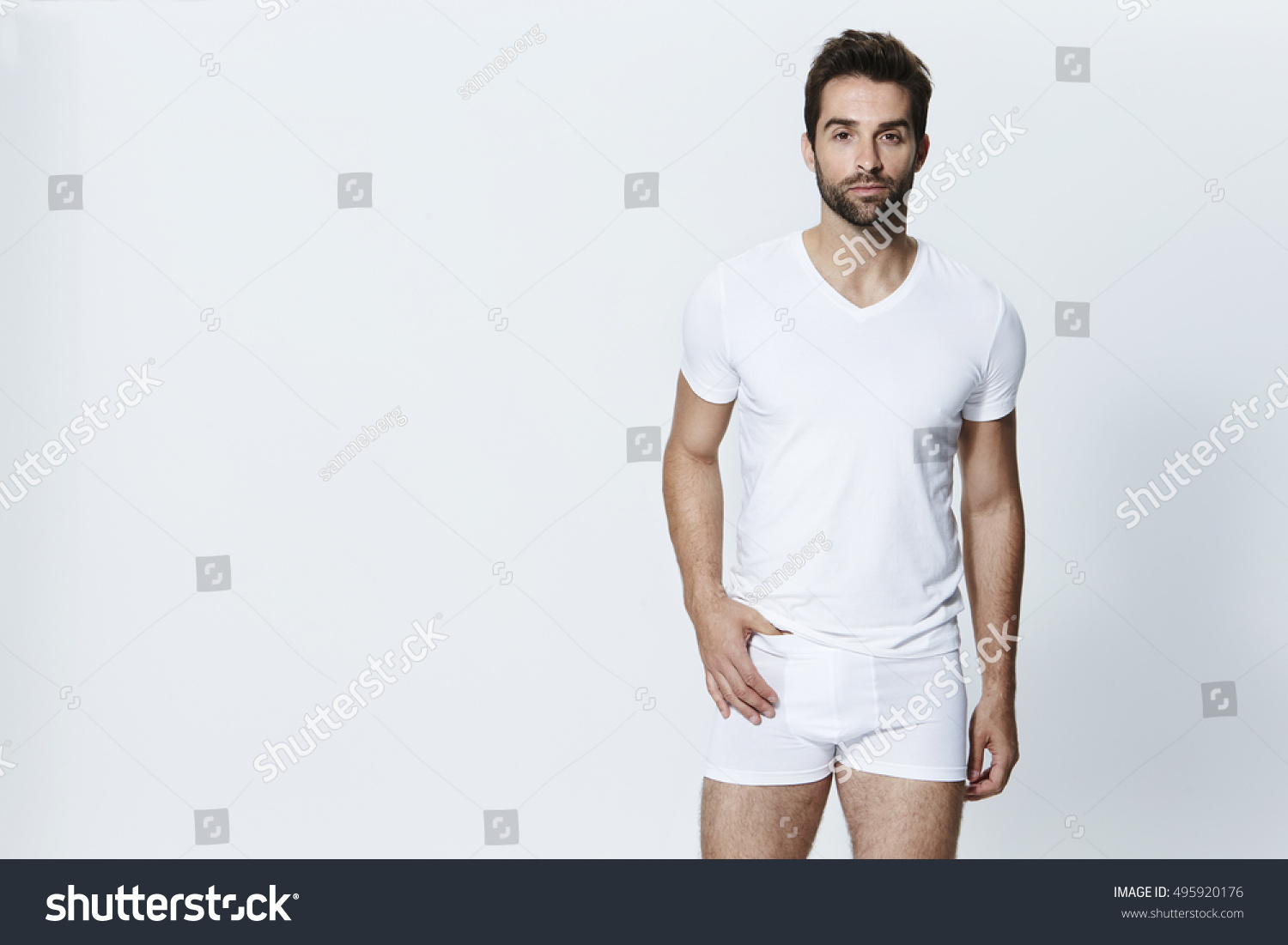 Guy in white underpants, looking at camera #495920176