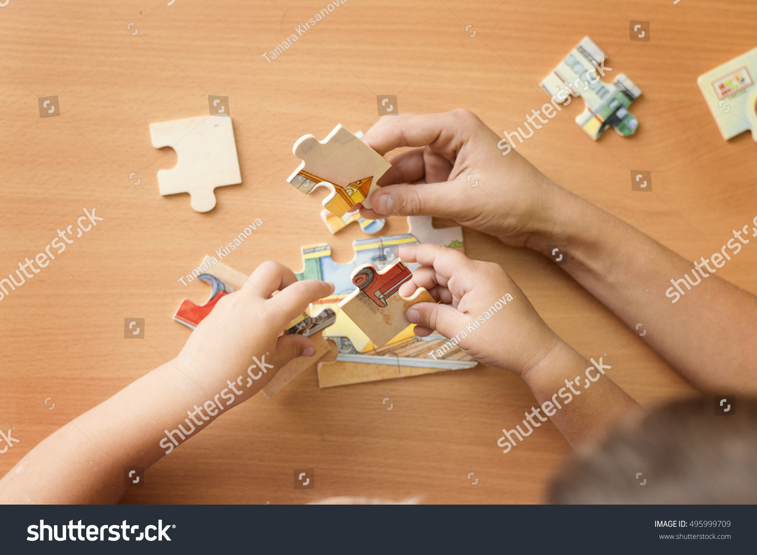 putting a puzzle together #495999709