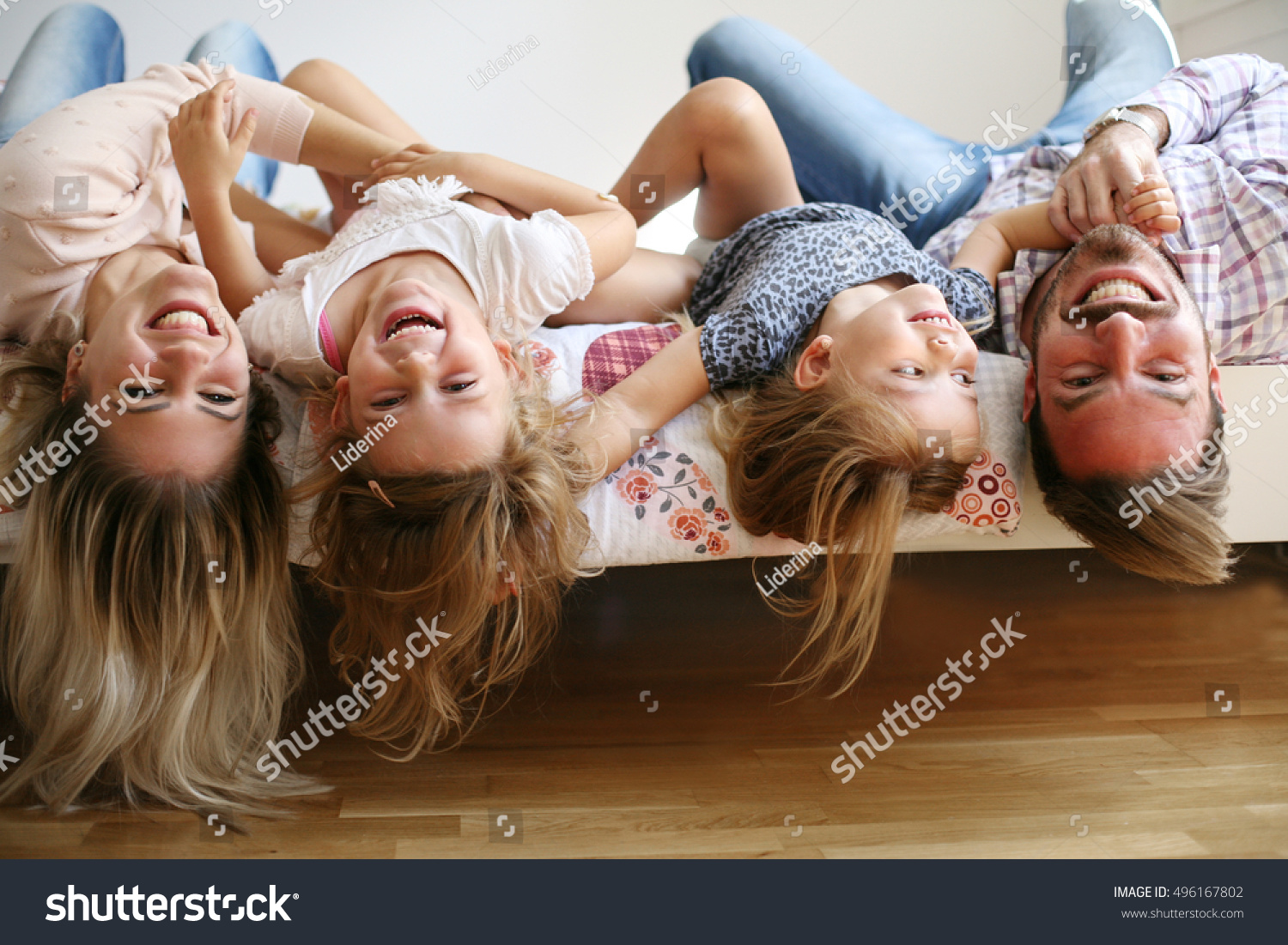 Family with two children having fun at home.  #496167802
