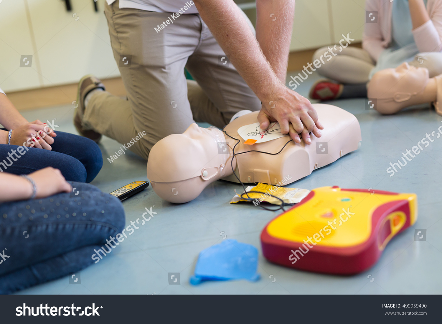 First aid cardiopulmonary resuscitation course using automated external defibrillator device, AED. #499959490