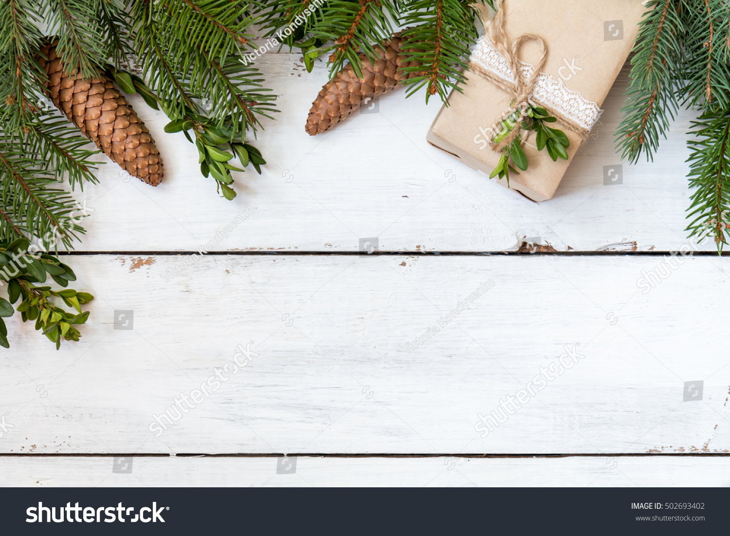 Christmas fir tree with decoration on white wooden board #502693402