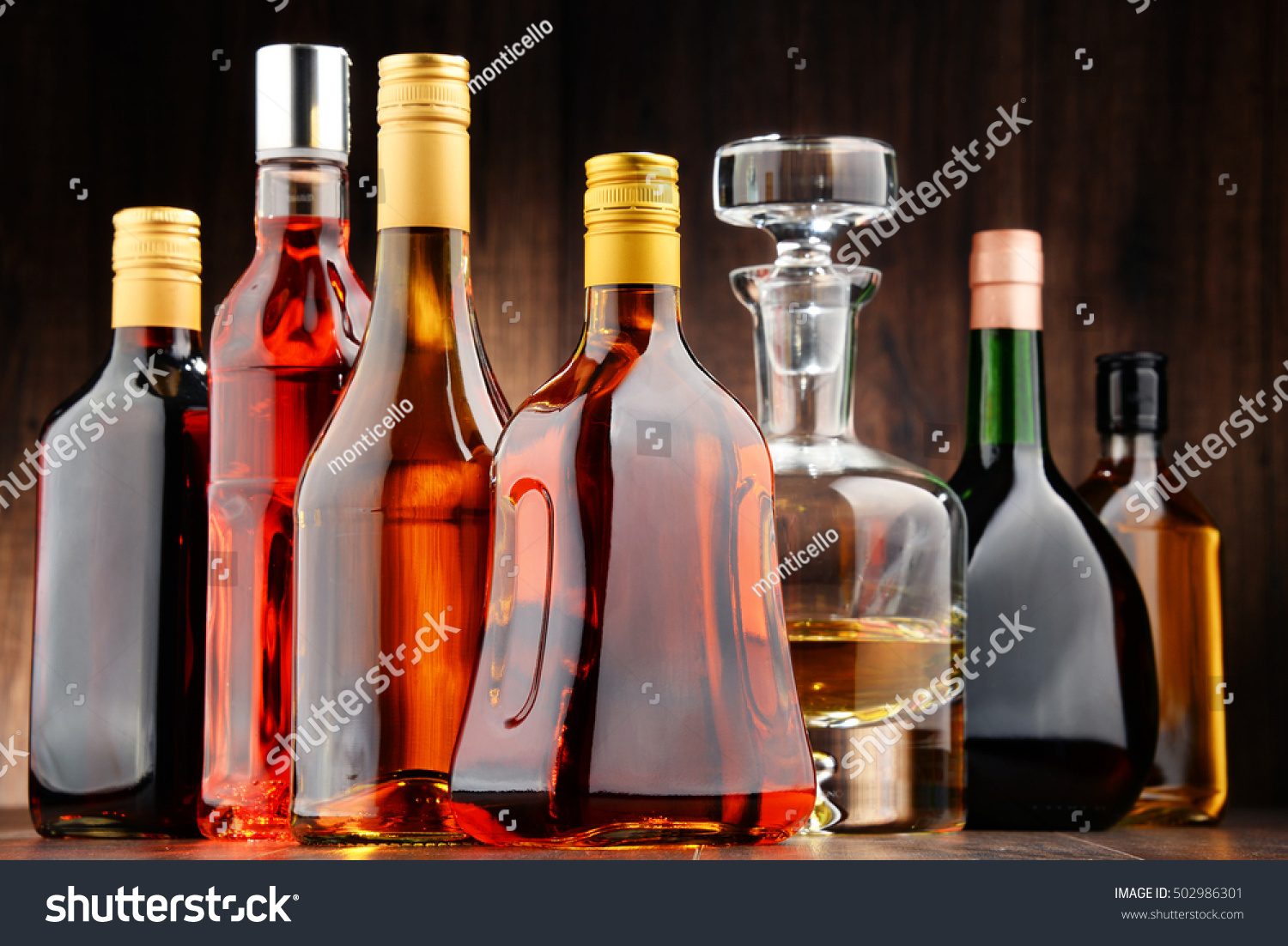 Composition with bottles of assorted alcoholic beverages. #502986301