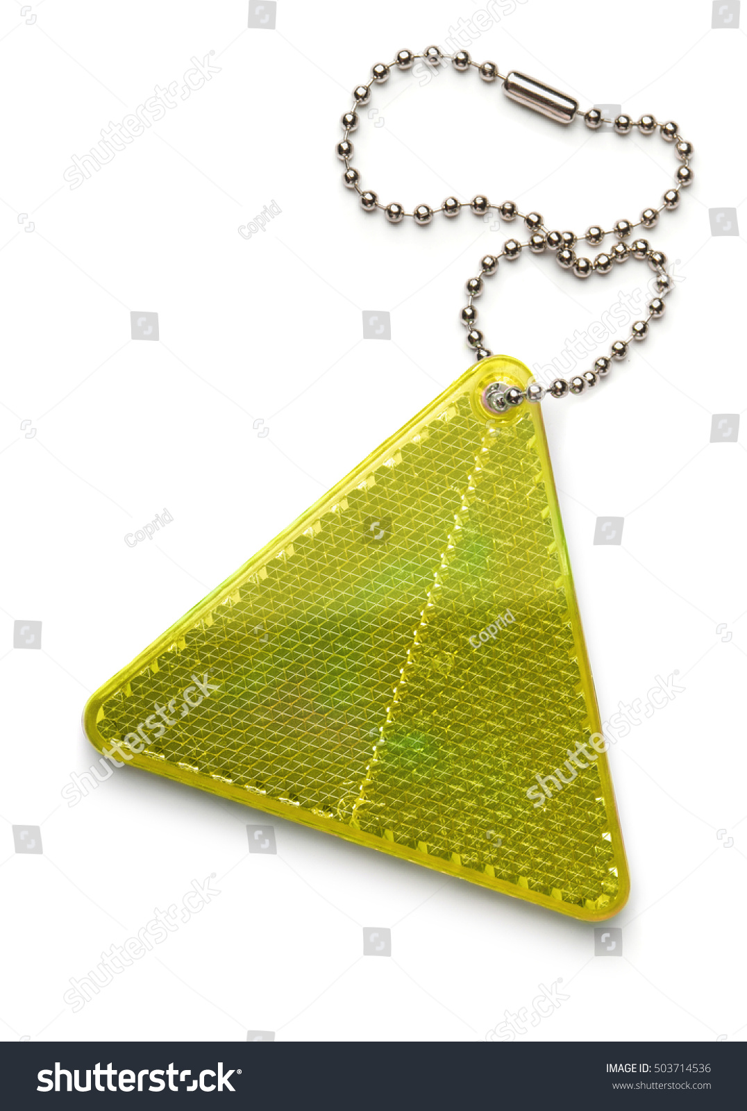 Yellow pedestrian safety reflector keyring isolated on white #503714536