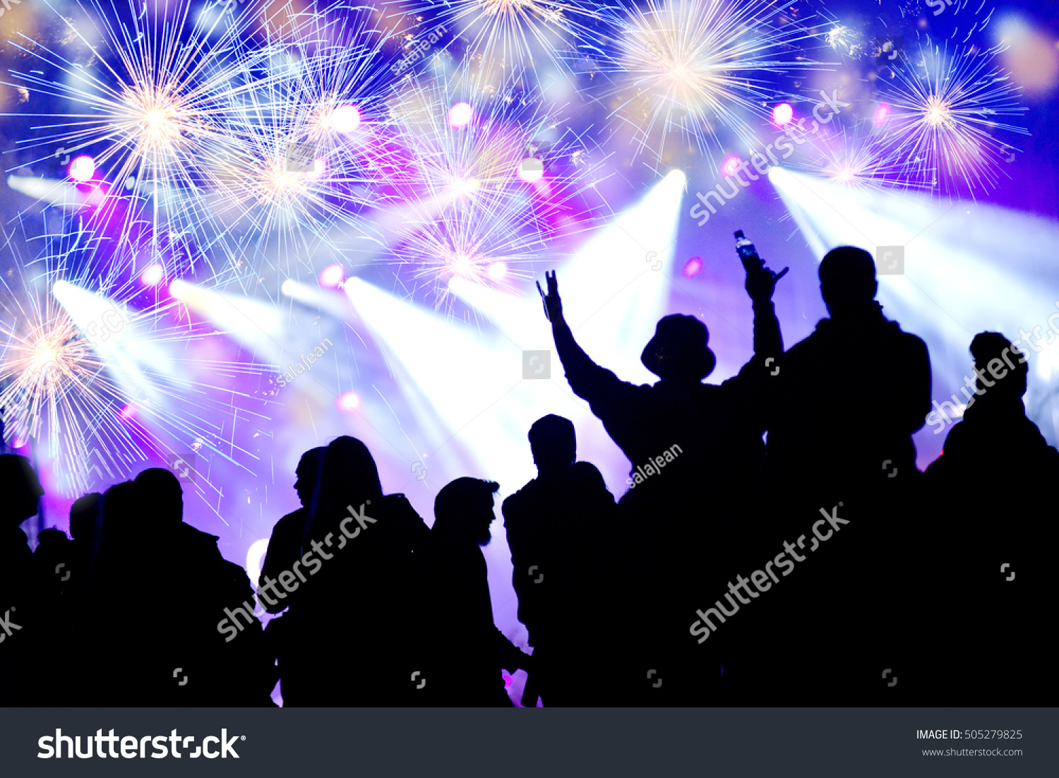 New Year concept with celebrating crowd and fireworks #505279825