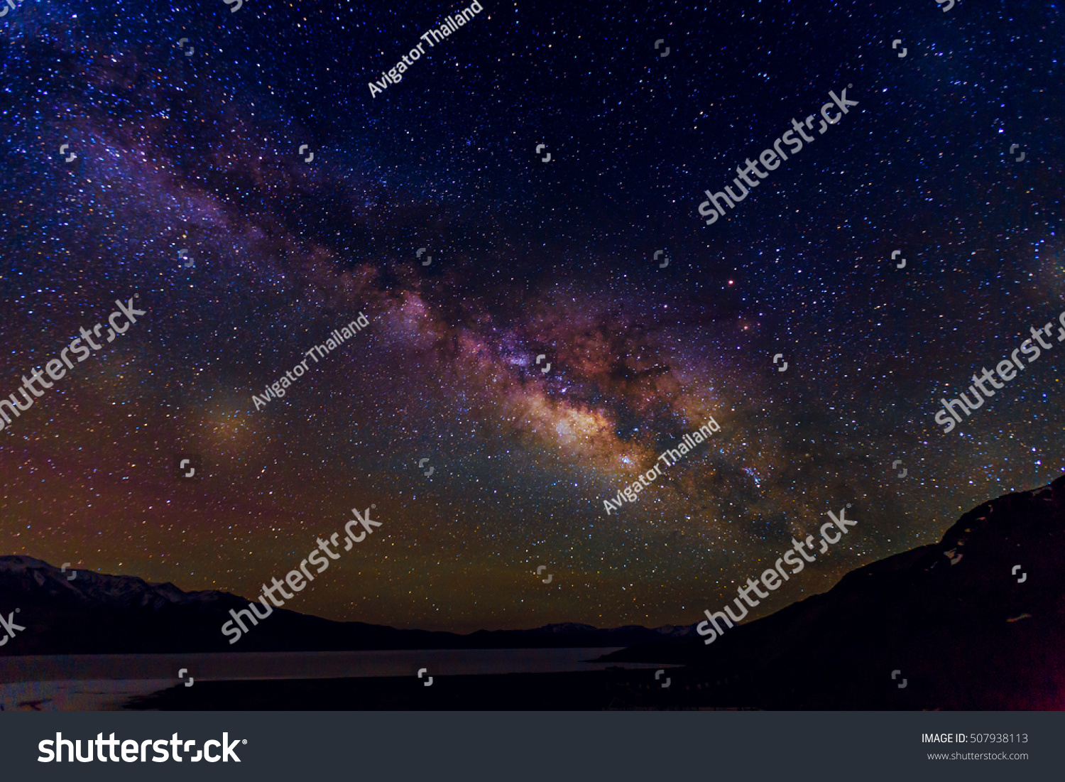 Milky way galaxy with star and space dust in the universe planet night sky background over mountain. #507938113