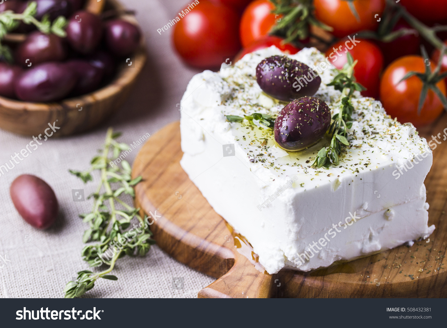 Greek cheese feta with thyme and olives, selective focus #508432381