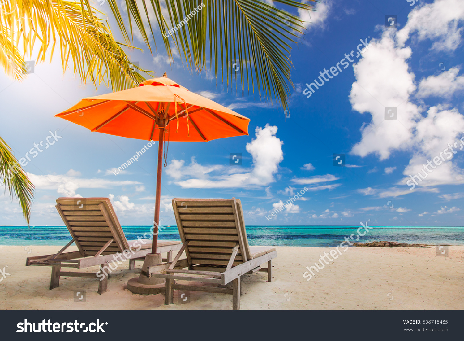Beautiful tropical beach landscape. White sand and coco palms landscape background concept. Amazing beach scene use for idyllic summer vacation and exotic holiday, luxury travel tourism destination #508715485