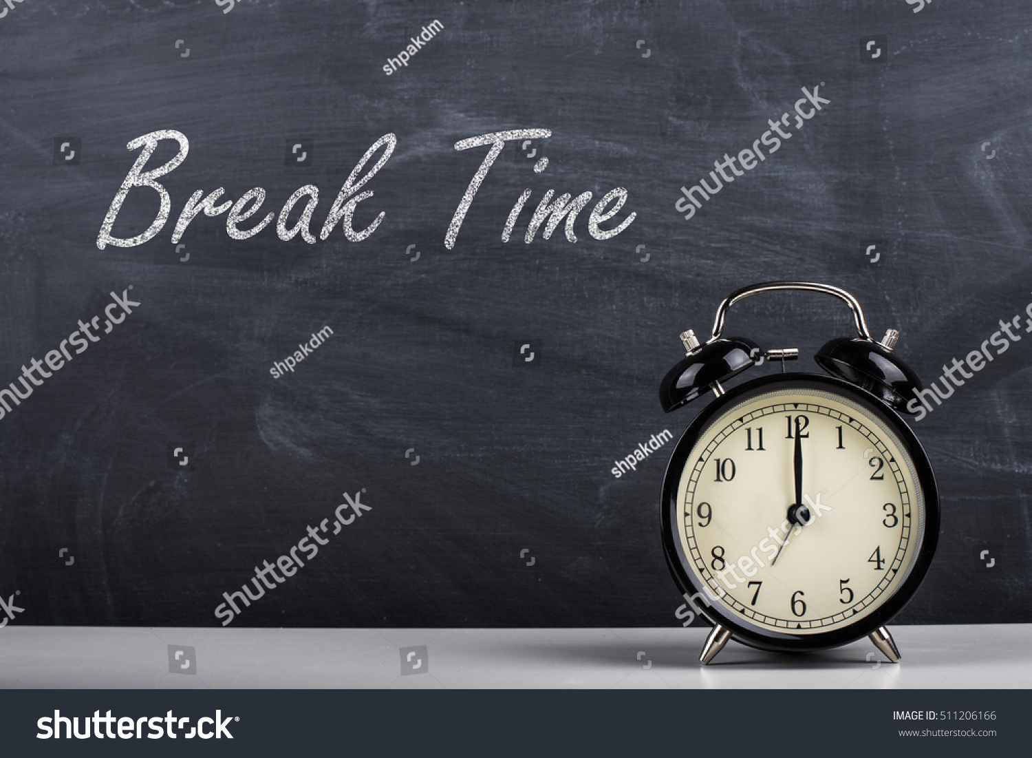  Text Break Time handwritten with white chalk on a blackboard and retro alarm clock #511206166
